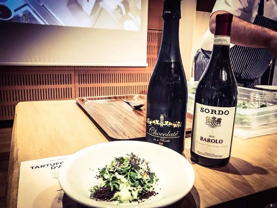 Risotto Gourmet with escargot, white Alba truffle and Chocolate in a Bottle. Chef Andrea La Rossa